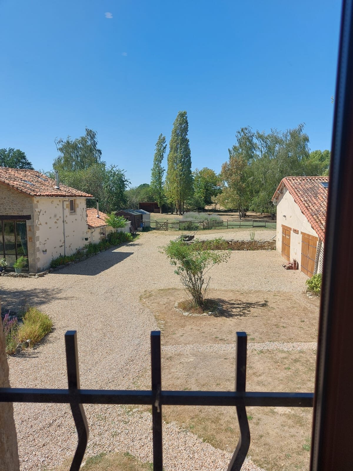 The welcoming courtyard at Lac de Maison